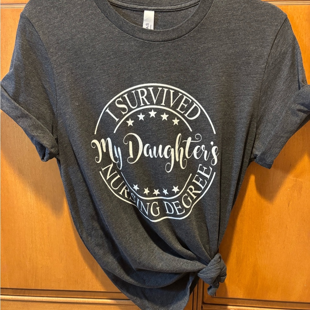 “I Survived My Daughter's Nursing Degree” t-shirt. Size: M